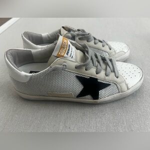Golden Goose women’s gray and milk color with black suede star.